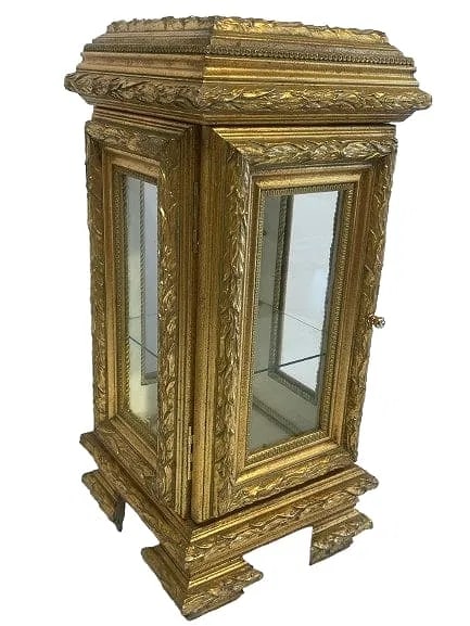 A vintage Italian Rococo style diminutive Display Case: A vintage Italian Rococo style diminutive Display Case with windows all around. Mirrored base and a glass shelve ready to display. Measuring 23 1/2 inches tall by 11 inches by 11 inch square.