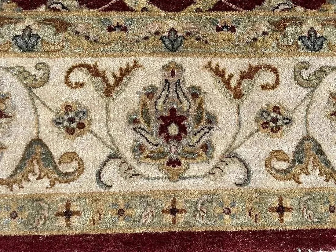 A handwoven room size oriental rug - 12