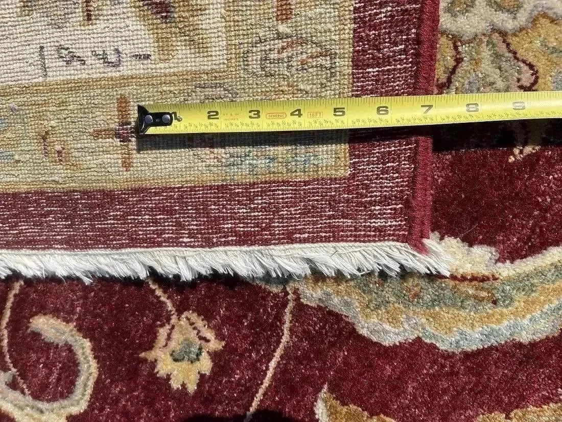A handwoven room size oriental rug - 8
