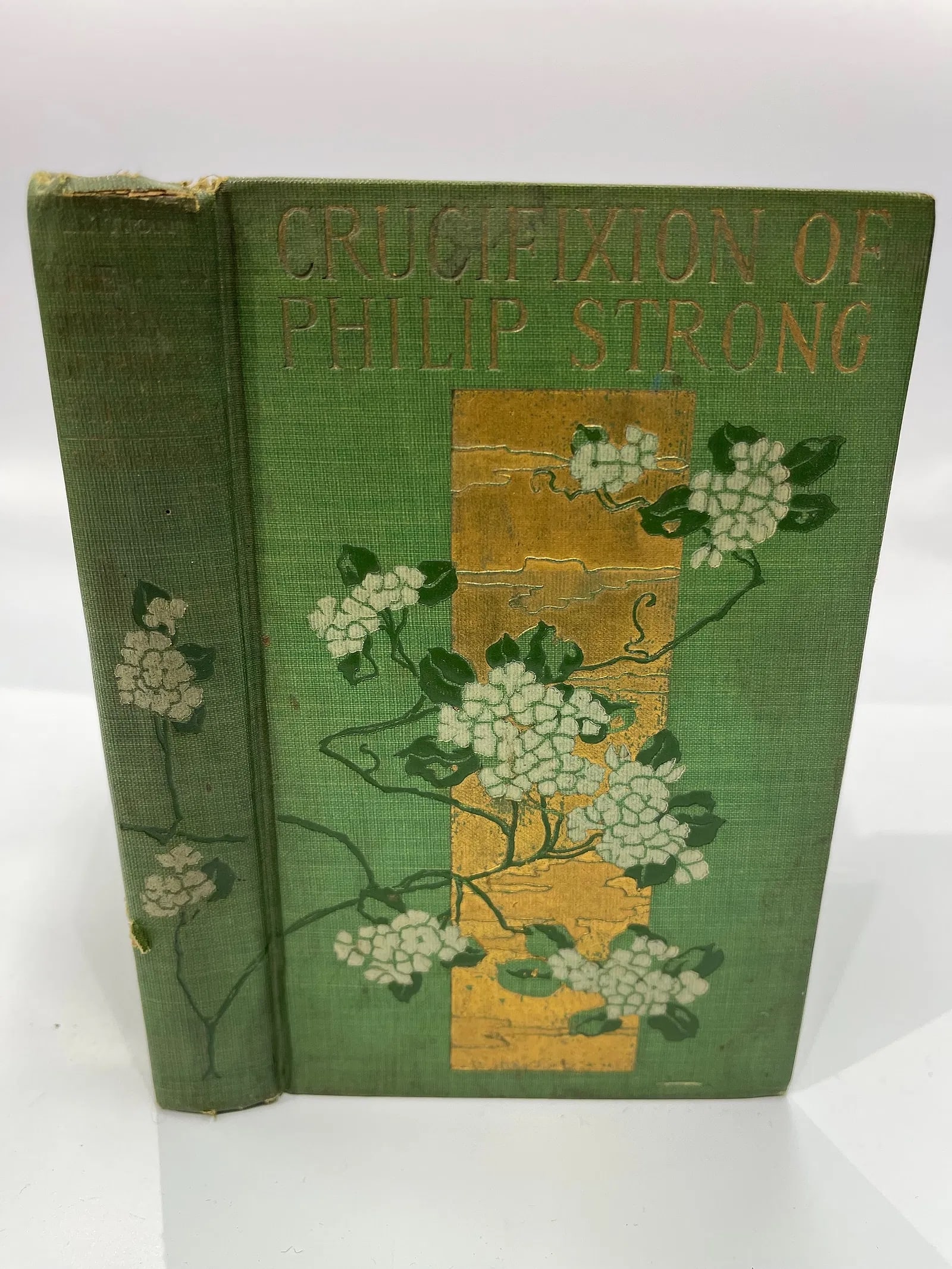 The Crucifixion of Philip Strong Ward BOOK by CHARLES M. SHELDON: A CHARLES M. SHELDON hard cover book titled:The Crucifixion of Philip Strong. Published in New york & Boston by H.M. CALDWELL COMPANY. A good condition copy. Undated, Some rubbing to edges and