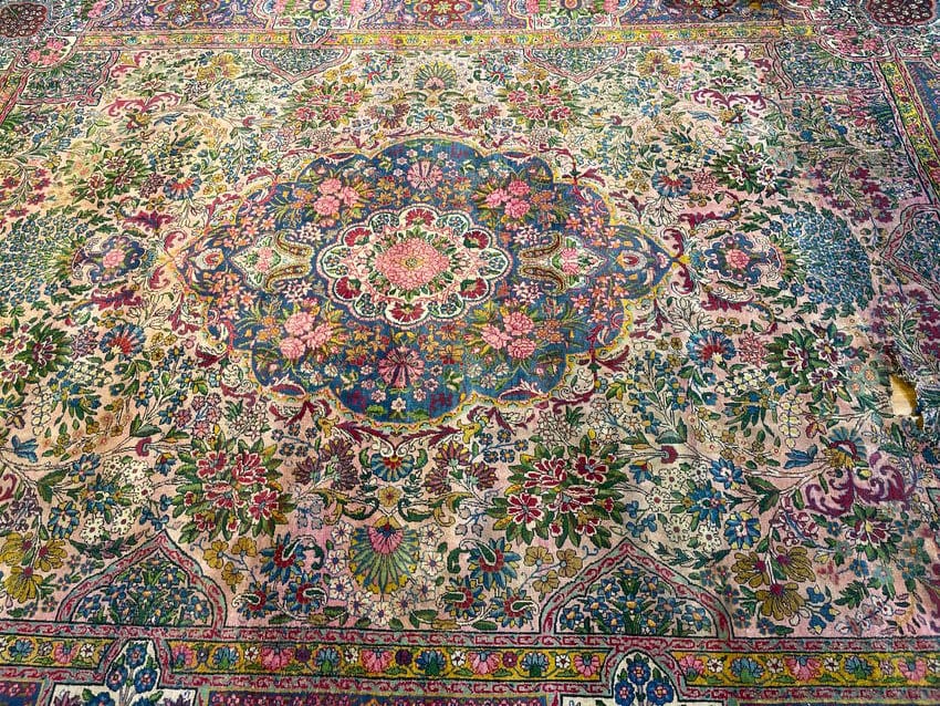 Antique Persian Kerman damaged room size rug: Antique Persian Kerman damaged room size rug measuring 8 feet 9 inches wide by 11 feet 3 inches long. Please read the condition report below.