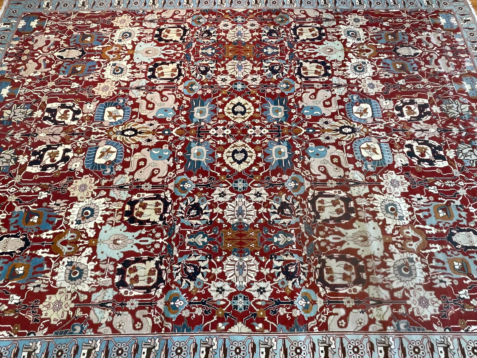 A turkish Tabriz Handwoven Oriental Rug 10 ft by 14 ft: A Turkish Tabriz Handwoven Oriental Rug measuring 10 ft wide by 14 ft long. A circa 1960's wool on wool handwoven rug display a highly decorative Persian Tabriz all over design.