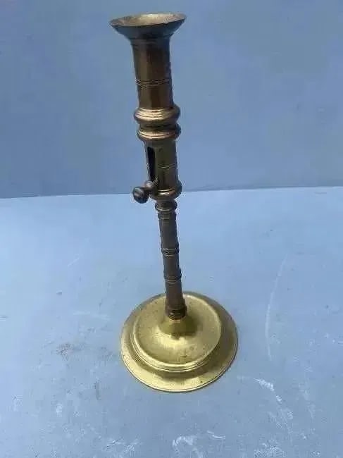 A Brass Candlestick with ejector - 8