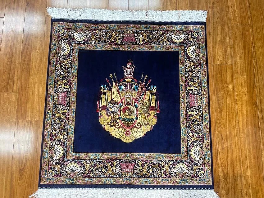 A small square silk rug - 13