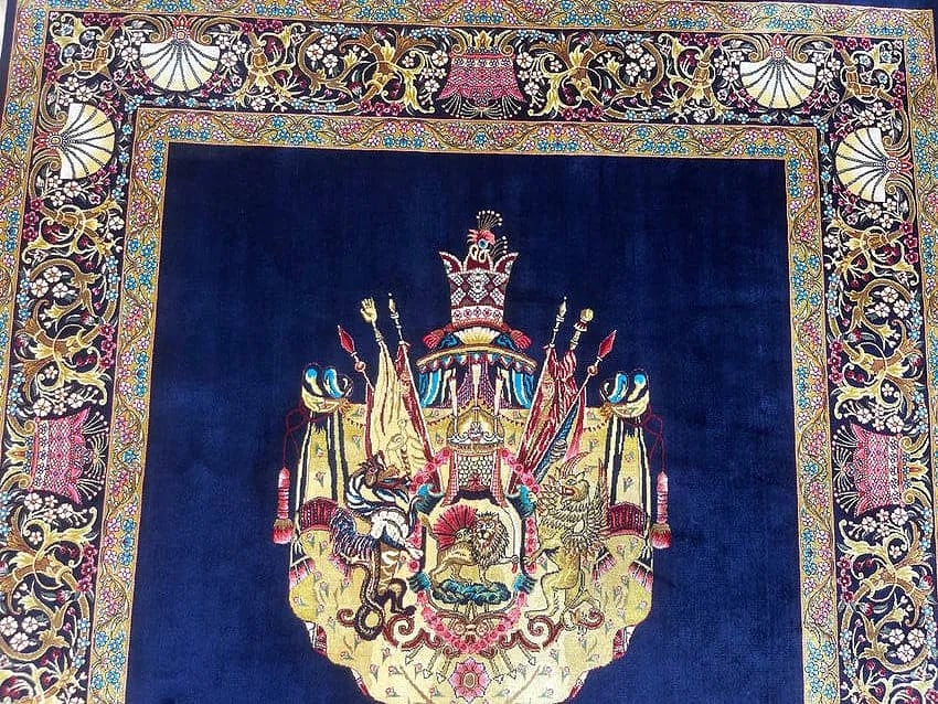 A small square silk rug - 7