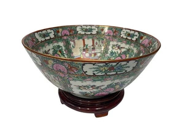 A Chinese export Famille Rose Medallion Porcelain Bowl: A Fine Chinese export Famille Rose Medallion Porcelain Bowl on a round wooden stand.A beautiful hand painted Chinese Famille rose medallion porcelain bowl measuring 14 inches in diameter.Chinese famil