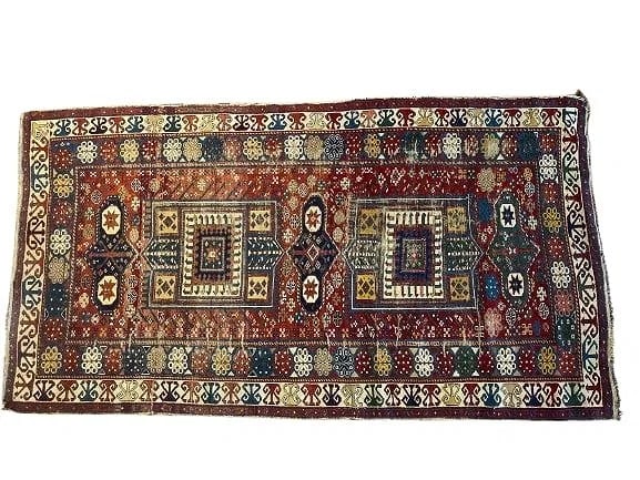 Antique Caucasian Shirvan rug: Antique Caucasian Shirvan rug. A scatter size rug measuring 4 feet 1 inches wide by 7 feet 5 inches long. A 19th century wool on wool genuine Caucasian Shirvan rug with a geometric tribal pattern.