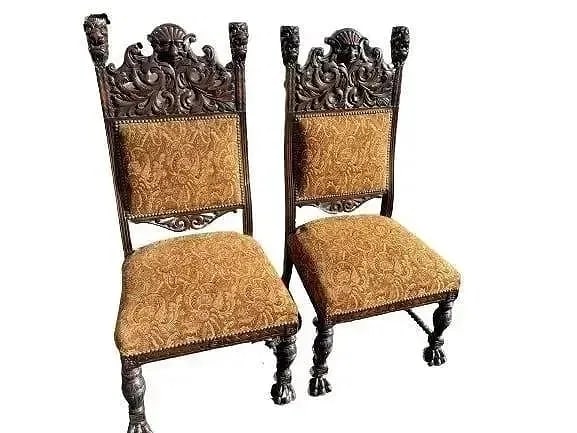 A Pair of European Gothic Renaissance chairs: A Pair of European Gothic Renaissance chairs measuring 21 inches wide x 18 inches deep x 47 inches tall x 19 inches seat height.