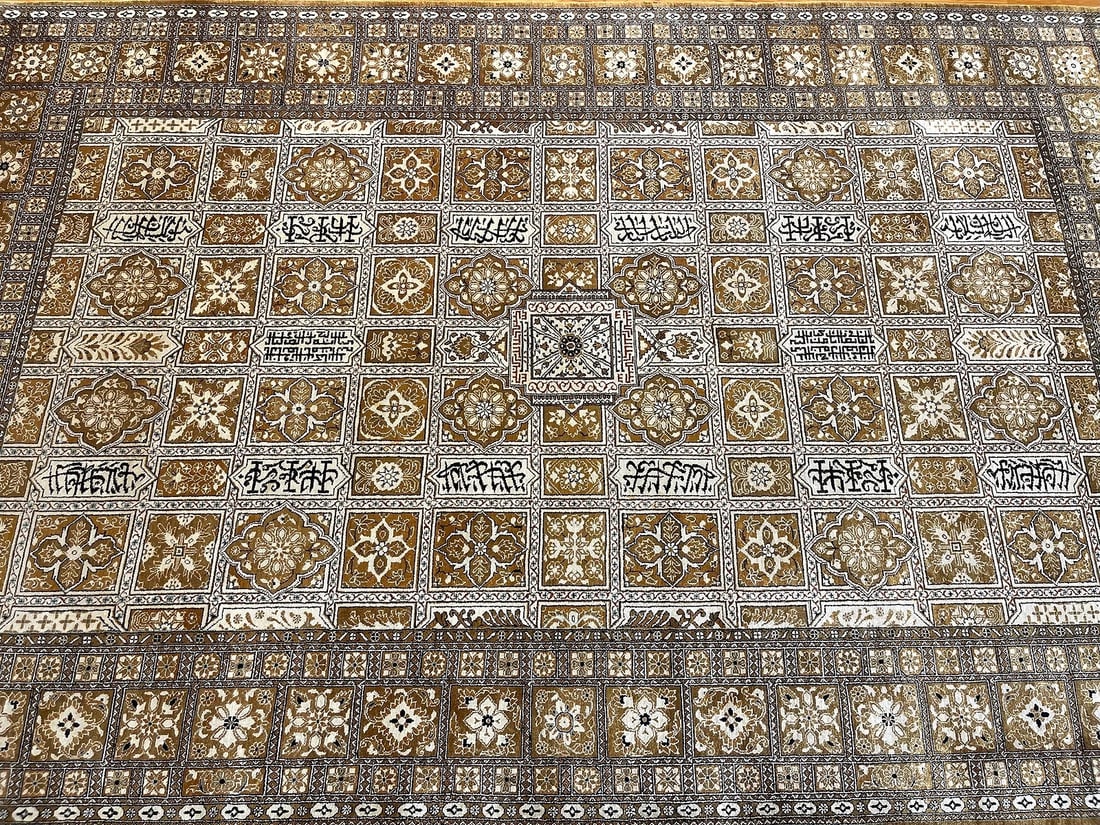 A Persian Silk Qum rug