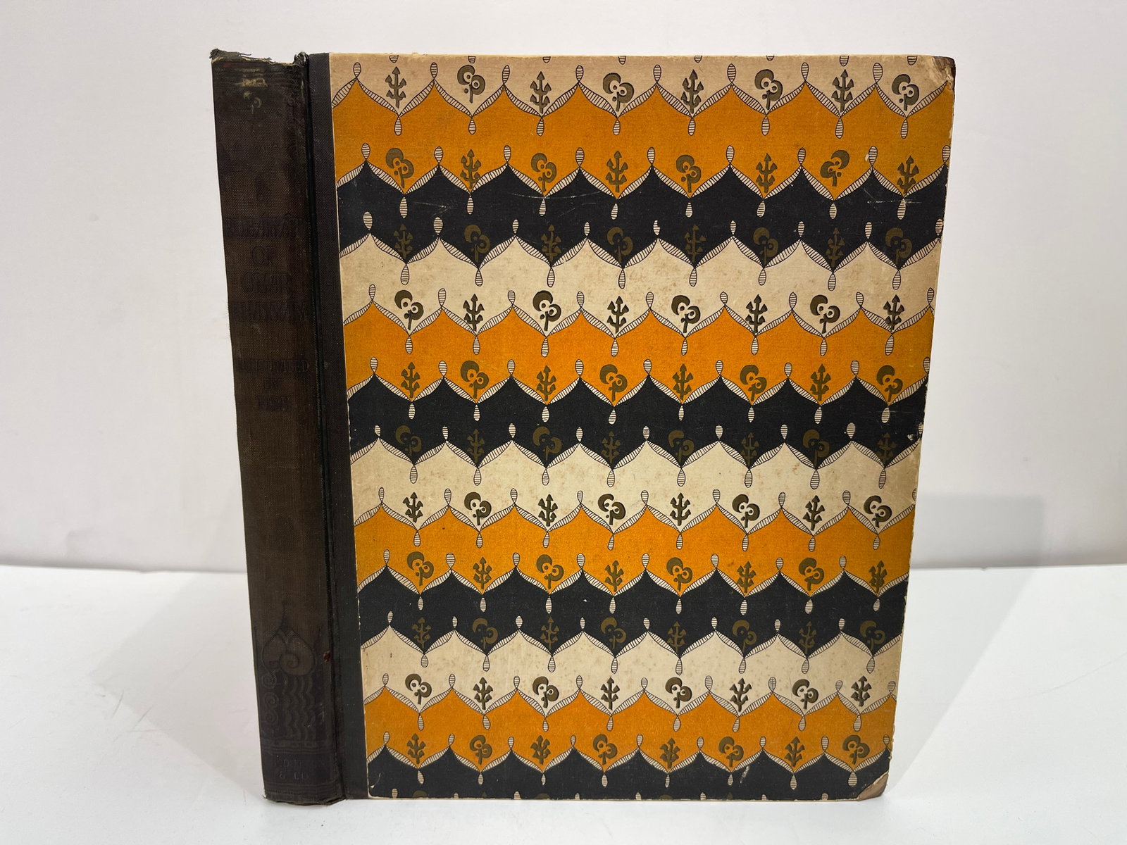 Antique first Edition of Omar Khayyam book: This is a 1922 edition of the Rubáiyát of Omar Khayyám Rendered in English by Edward Fitzgerald with decoration by Fish. featuring distinct Art Deco cover designs by illustrator Anne Harriet
