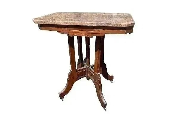 A Victorian Walnut Table with Marble Top: A Victorian Walnut Table with Marble Top table top measure 24 inches wide by 31 inches long.
