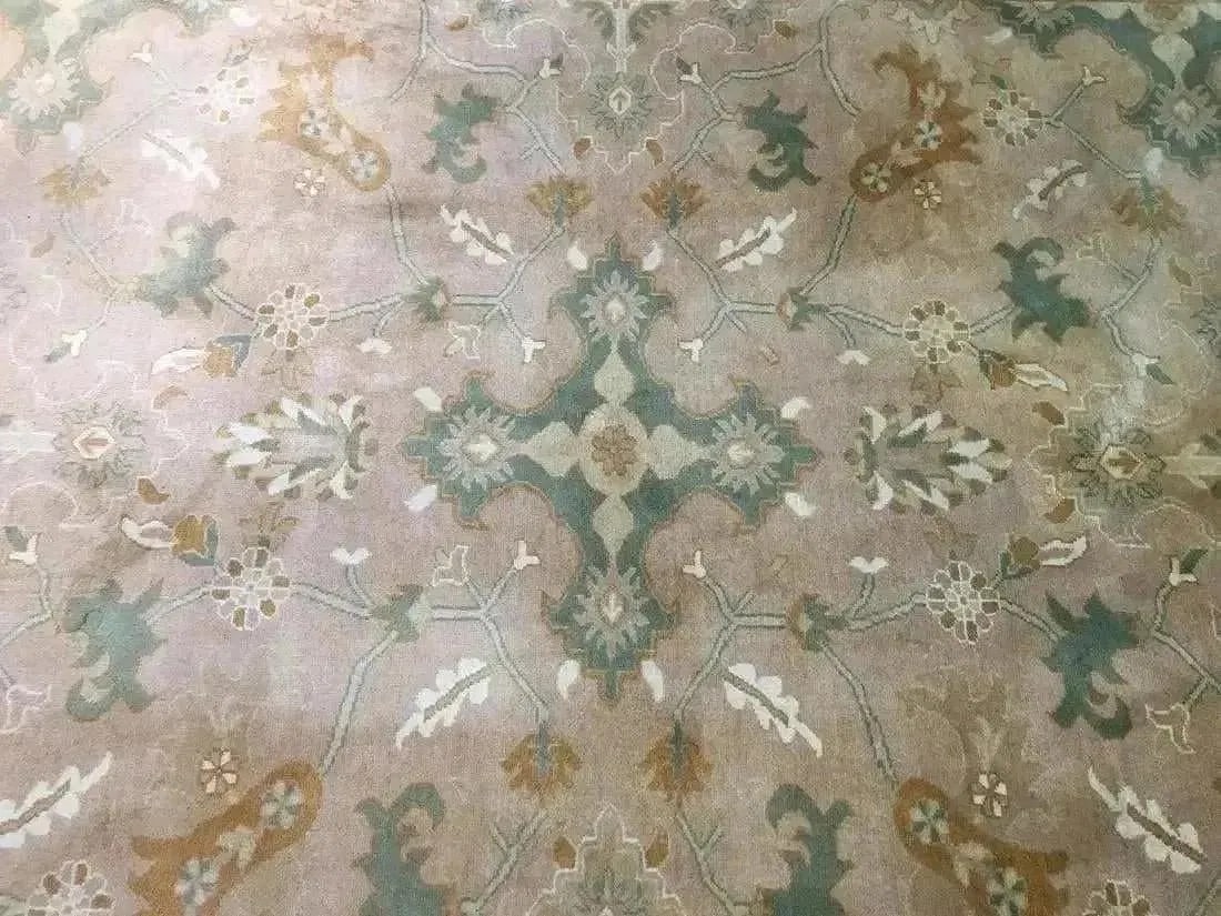 Hand woven Pakistan room size rug: A hand woven pakistan room size rug Measuring 7 ft 2 inches wide by 9 ft 4 inches long.