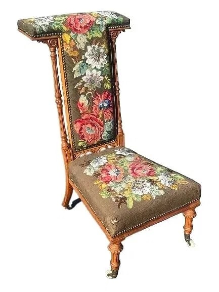 Antique French Carved PRIE DIEU Prayer Chair: Antique French Carved PRIE DIEU Prayer Chair with detailed Needlepoint upholstery. Antique stamped White Porcelain Caster Wheels on all four legs.