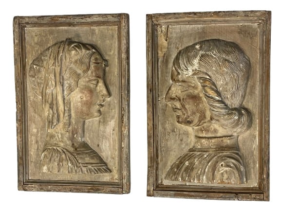 Antique pair of Italian hand carved reliefs of Medici and his wife: Antique pair of Italian hand carved reliefs of Medici and his wife. Each measuring 14 inches wide by 21 1/2 long hand carved wood.The Medici Bank was Founded by Giovanni di Bicci de Medici in 1397, th