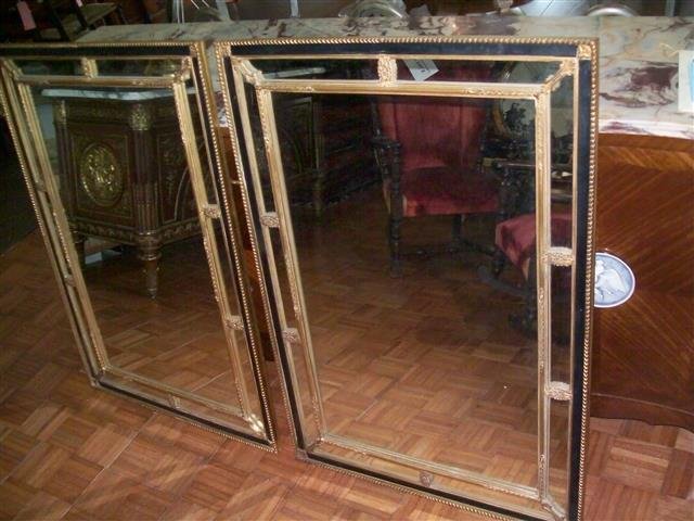 Pair of large Empire style Antique Mirrors 33" by 47": An outstanding pair of large French Empire style Antique Mirrors. Each measuring 33" inches wide by 47" inches long. Very decorative and desirable pair to create balance in any decor setting.