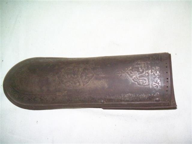 Antique Persian ELBOW GUARD BAZU BAND circa 1890: Important ANTIQUE PERSIAN ELBOW GUARD BAZU BAND.CIRCA 1890'SHand hammered with floral borders and arabic inscriptions. design measuring 13" inches x 4" inches.