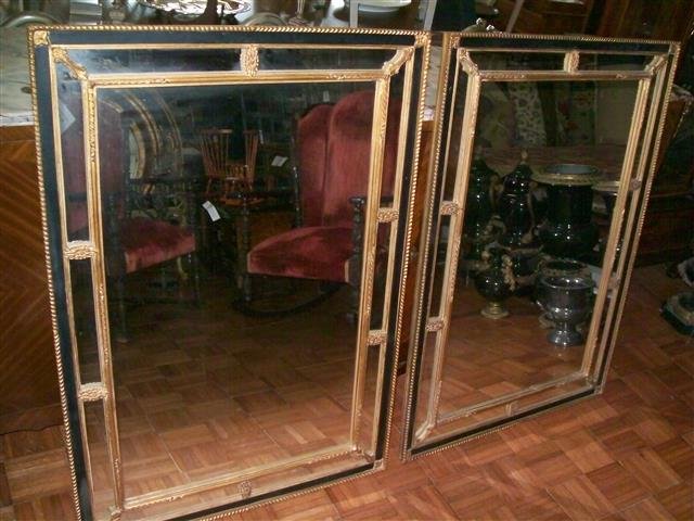 Pair of large Empire style Antique Mirrors 33" by 47": An outstanding pair of large French Empire style Antique Mirrors. Each measuring 33" inches wide by 47" inches long. Very decorative and desirable pair to create balance in any decor setting.