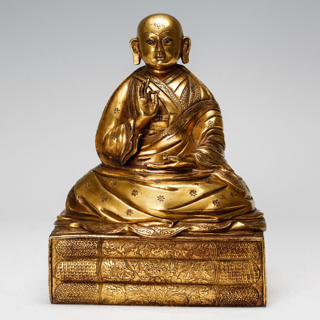 CHINESE GILT BRONZE FIGURE OF SEATED GURU (1 of 10)