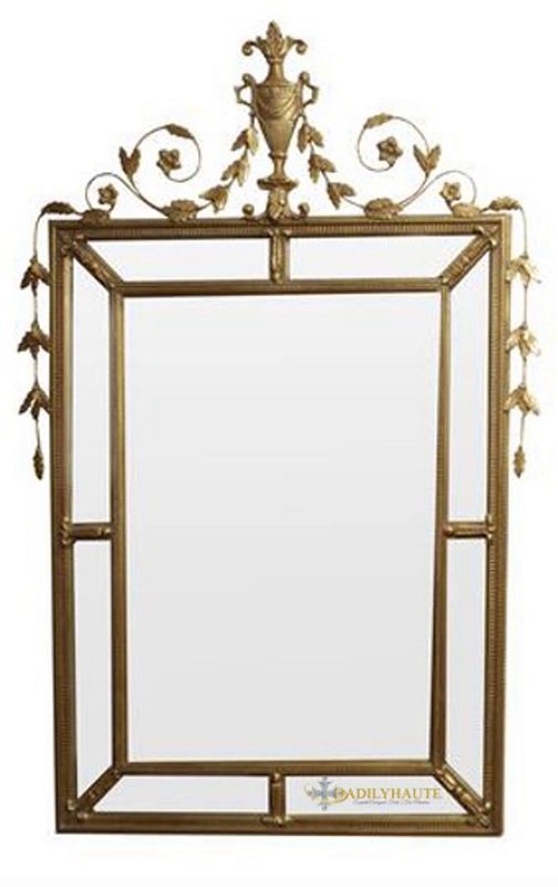 GEORGE III STYLE GILTWOOD MIRROR: 20th c. With decorative scroll work around cushion frame. 54 inches H x 37 inches W