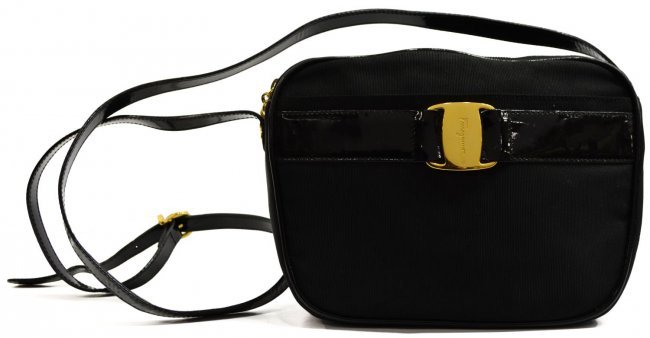 SALVATORE FERRAGAMO BLACK SHOULDER BAG: Salvatore Ferragamo black shoulder bag with patent leather adjustrable straps, gill hardware marked Ferragmo, single zipped pocket internatenet leather adjustable strap and trim. Single zipper pocket