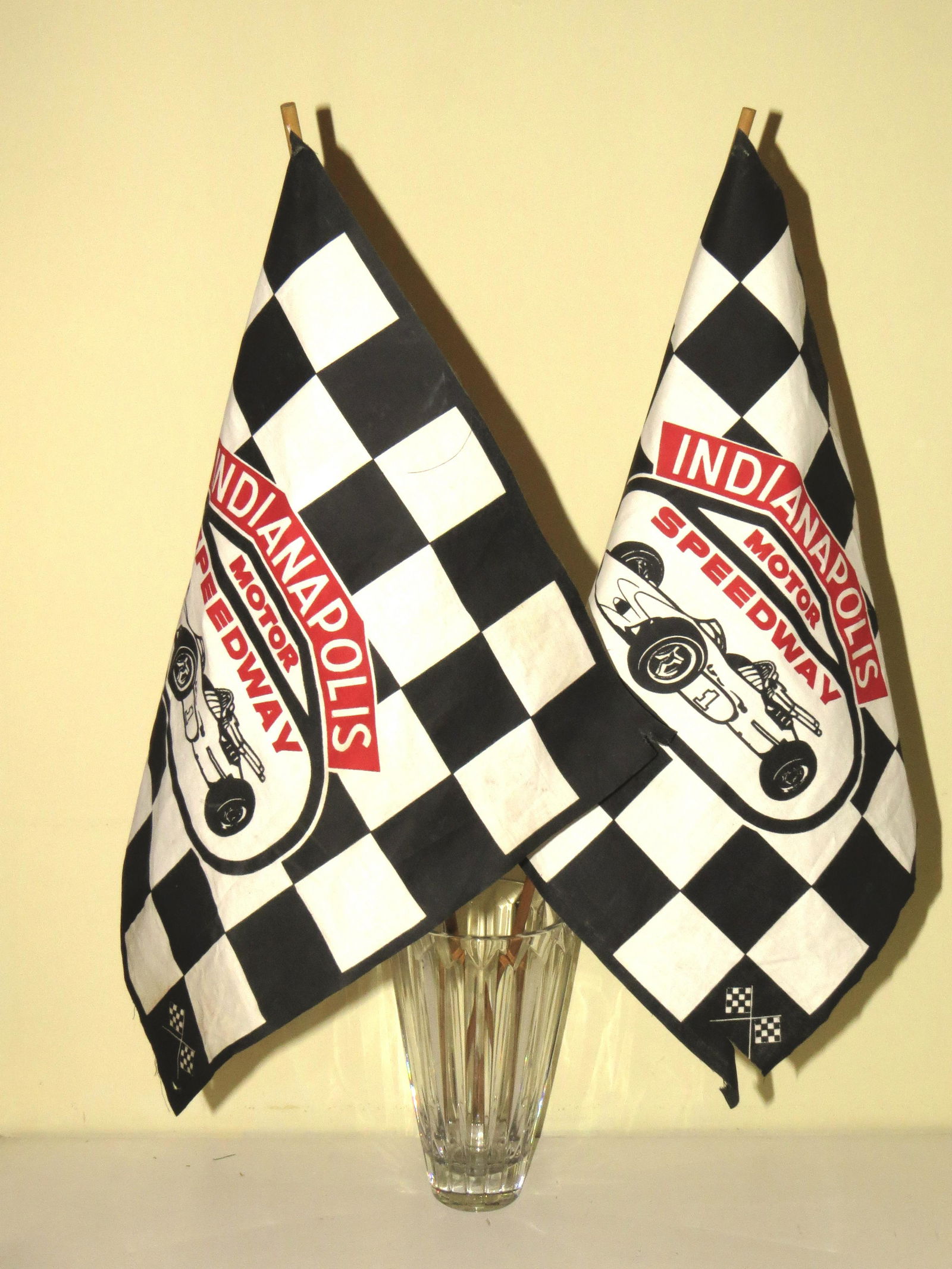 Indianapolis Motor Speedway - Indy 500 Parade souvenir: Indianapolis Motor Speedway - Indy 500 Parade souvenir Flags. Circa mid 1960s. Based on the car pictured they appear to be 1964/65 era. Great overall condition, but they are old, and there is a little