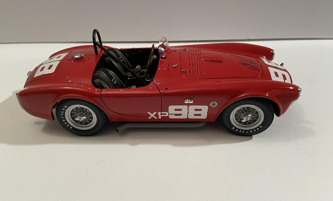 Shelby Cobra 260 Exoto Model Signed: Shelby Cobra 260 Exoto Model Signed by Bill Krase who was the fist driver hired by Carroll Shelby for the Cobra program. From the collection of an internationally known vintage racer.