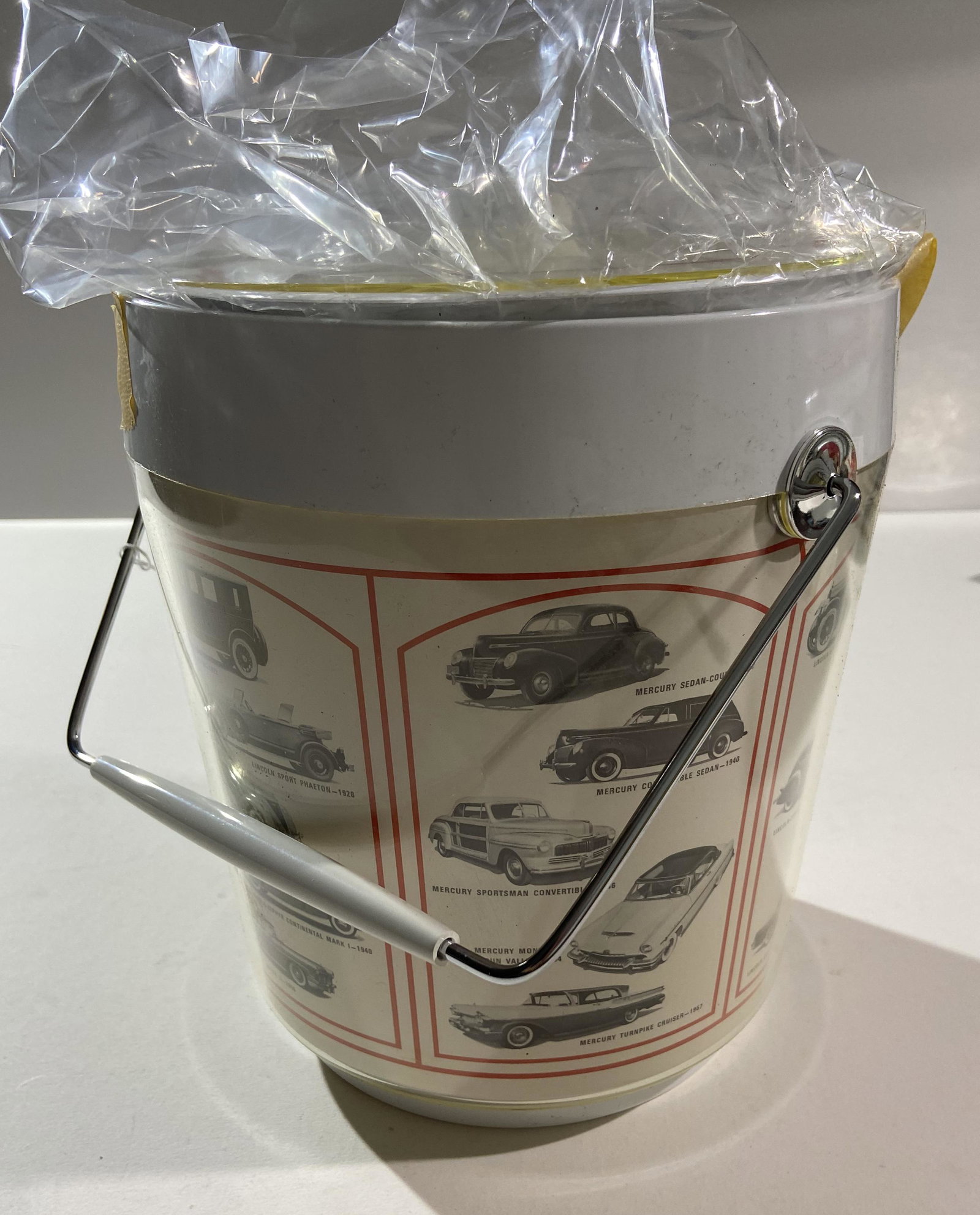 Mercury and Lincoln, Ford Factory Ice Bucket Dealer: Mercury and Lincoln, Ford Factory Ice Bucket Dealer item with multiple photos fo old Lincoln’s and Mercury cars going around the ice bucket measuring 10” tall, Original American Dealership item fr