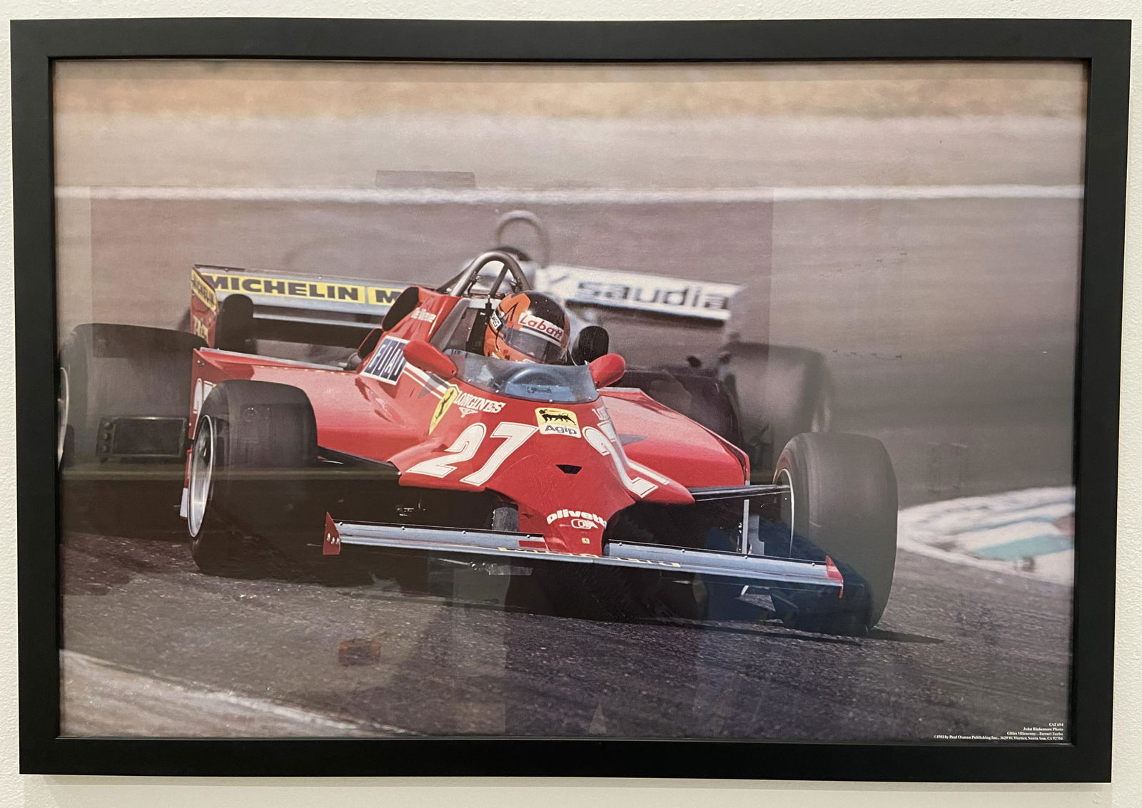 Giles Villeneuve Ferrari Turbo Formula One race car poster: Giles Villeneuve Ferrari Turbo Formula One race car poster photography by John Blakemore and published by Paul Oxman the frame measures 26.25 x 37 inches