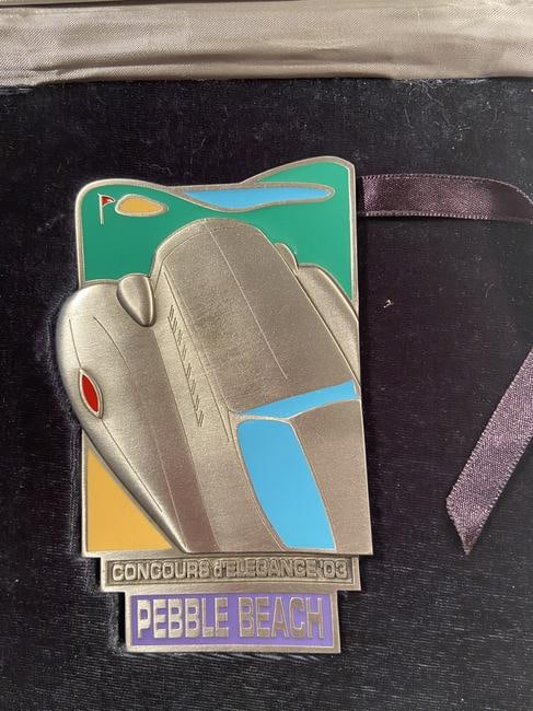 Pebble Beach Concours Participant Award Metal Plaque, Numbered: An item for the Gentleman Car Owner!! Pebble Beach Concours Participant Award Metal Plaque, In custom jewel box, measuring 7.5â€ x 7.5â€ x 1.25â€ . The multi colored metal plaq