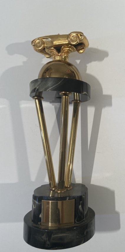 Rare Sports car race trophy, Ferrari or Cobra topper: Rare Sports Car Race Trophy, Ferrari or Cobra topper, No inscription on the metal plaque-looks like you just came in first place!! 15 inches tall, base 5 inch diameter