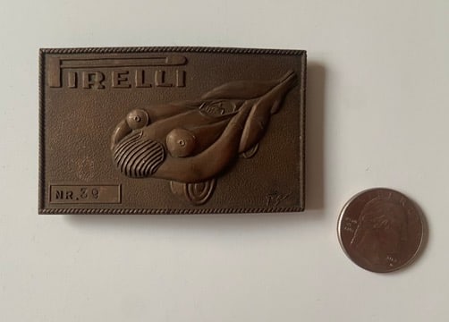 PIrelli NR 39 Numbred vinage 1960/70's Brass Belt Buckle, Made in Italy: PIrelli NR 39 Numbered vintage 1960/7 0's Brass Belt Buckle, Stamped on back Made in Italy. One of these sold at Bonhams for several thousand dollars. Has been with consignor for over twenty years.