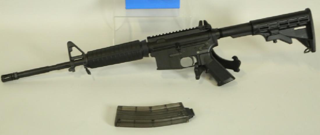 BUSHMASTER C22 .22 LONG RIFLE: BUSHMASTER C22 .22 LONG RIFLE (BRAND NEW IN BOX) CALIBER: .22 LR SERIAL NUMBER: BK3034615 (011)