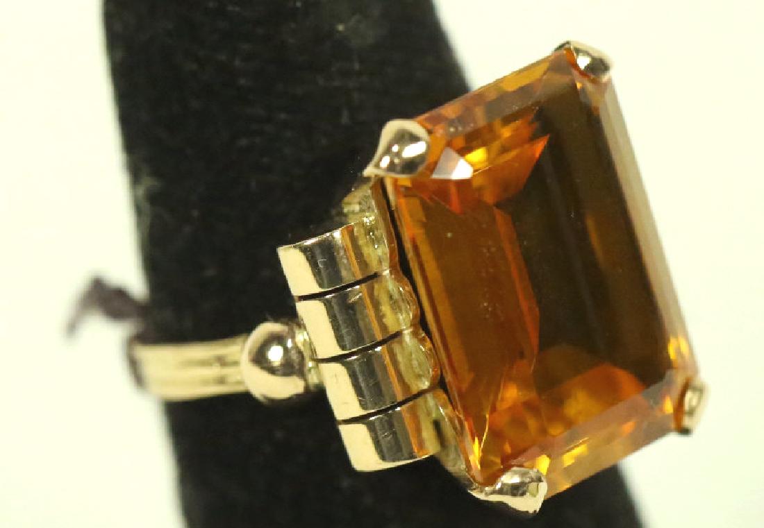 14 KT ANTIQUE ROSE GOLD YELLOW SAPPHIRE RING: STAMPED 14 KT ANTIQUE ROSE GOLD RING, SET WITH NATURAL YELLOW SAPPHIRE. THIS CIRCA (1930s) RING HAS A 10.00 ct SAPPHIRE OF EXCEPTIONAL COLOR. THE TOTAL GRAMWEIGHT IS OVER 9 GRAMS. SIZE 7.