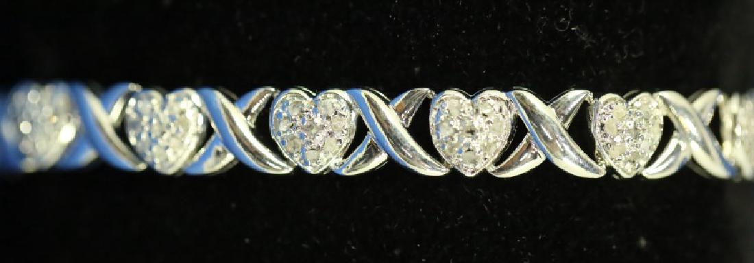 SI.MICRO PAVE DIAMOND HEART & CROSS MOTIF BRACELET (1 of 3)