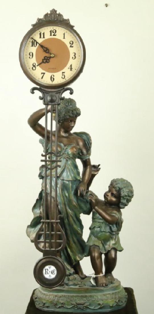 MOLDED RESIN CLOCK SCULPTURE (1 of 4)