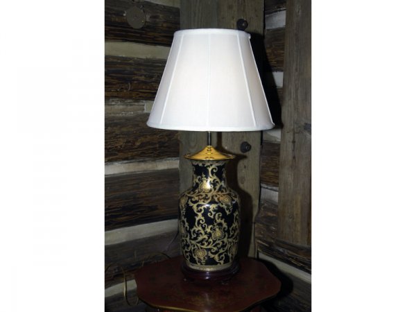 Set of three, black and gold painted floral lamps