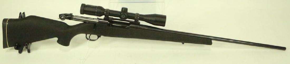 WEATHERBY MARK V: WEATHERBY MARK V FIBERMARK MODEL IN POPULAR 257 WEATHERBY WITH ZEISS CONQUEST SCOPE