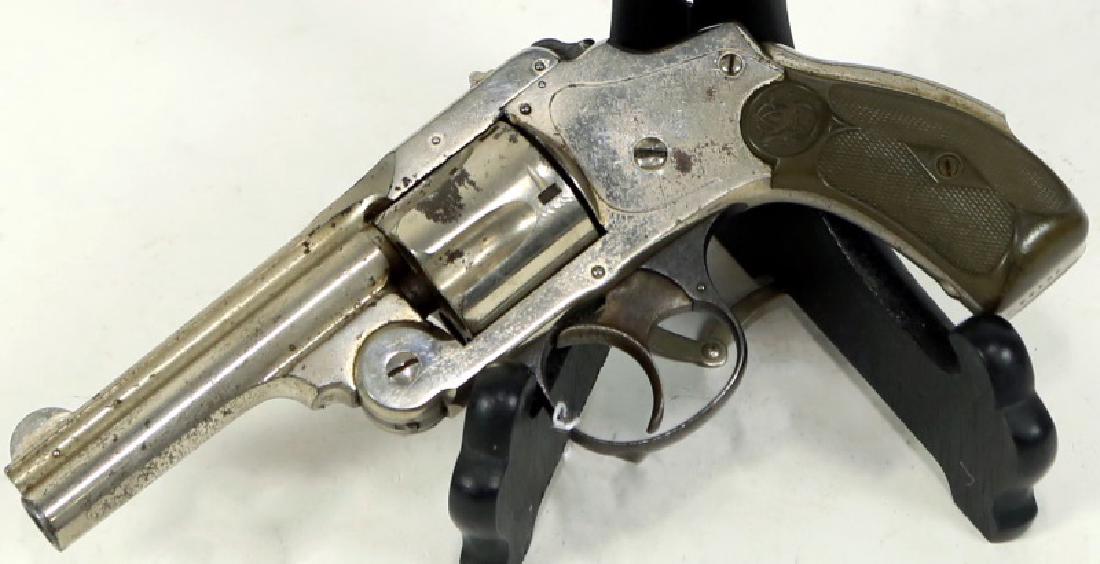 SMITH & WESSON 38 SAFETY THIRD MODEL .38 S&W: SMITH & WESSON 38 SAFETY THIRD MODEL .38 S&W REVOLVER. NEW DEPATURE/38 SAFETY MODEL MADE IN THE MID 1890's. APPROXIMATELY 75-80% ORGINAL NICKEL FINISH. CALIBER: .38 S&W SERIAL NUMBER: 59153 (ANTIQUE)