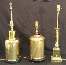 Set of three brass lamps in various size and desig