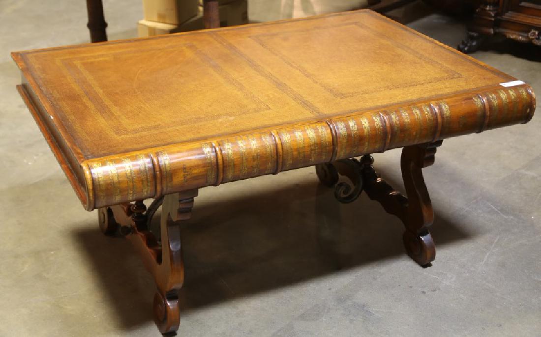 THEODORE ALEXANDER FAUX BOOK MOTIF COFFEE TABLE: THEODORE ALEXANDER FAUX BOOK MOTIF COFFEE TABLE WITH TWO DRAWERS. Height: 23 in. by Width: 48 in. by Depth: 24 in.