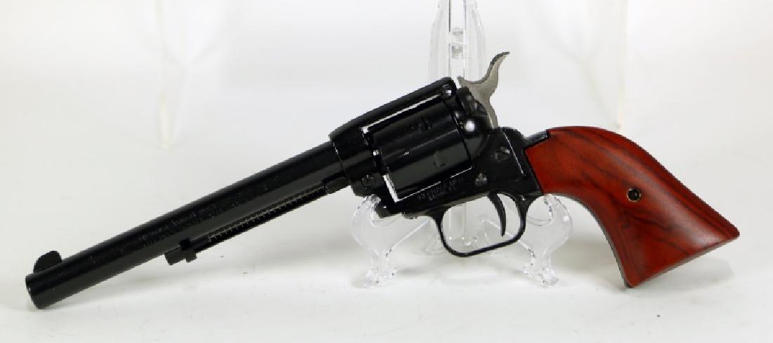 HERITAGE ROUGH RIDER .22 LR REVOLVER: HERITAGE ROUGH RIDER .22 LR REVOLVER CALIBER: .22 LR SERIAL NUMBER: W04581 (L1149)