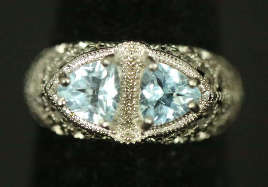 LADIES STERLING SILVER BLUE TOPAZ COCKTAIL RING. SIZE 7 (1 of 4)