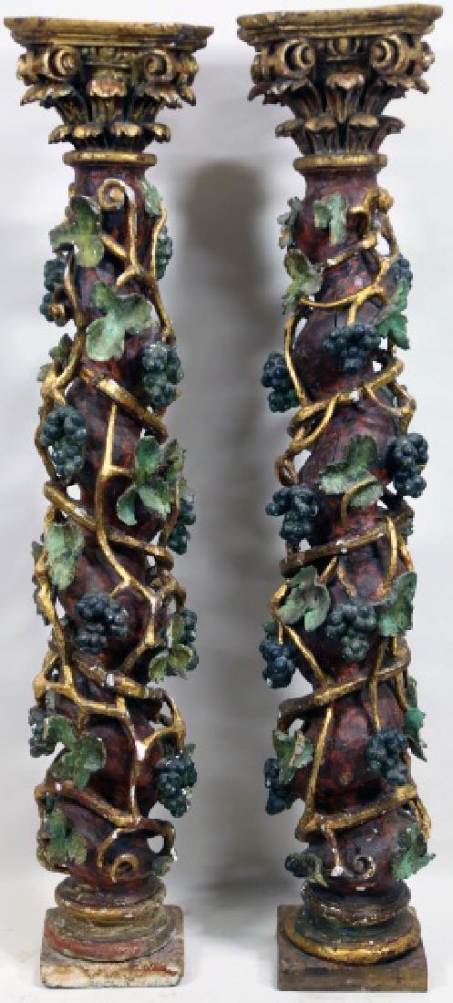 PAIR OF 18th CENTURY WOOD CARVED BAROQUE COLUMNS: A VERY FINE PAIR OF 18th CENTURY WOOD CARVED BAROQUE ROPE TWIST COLUMNS MOUNTED WITH GRAPES & GRAPE LEAVES MOTIF AND TOPPED WITH CARVED CAPITALS. Height: 56 in. by Width: 11 1/2 in. by Depth: 11 1/2 i