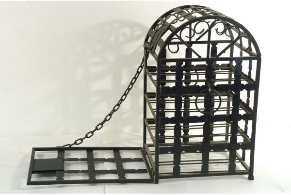 black iron wine rack with draw bridge door