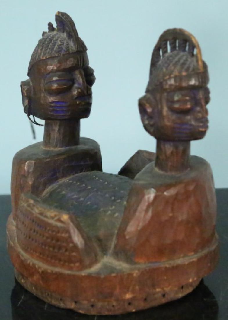 ANTIQUE AFRICAN CARVED WOOD ELEMENT: ANTIQUE AFRICAN CARVED WOOD ELEMENT Height: 9 1/2 in. by Width: 8 in. by Depth: 8 1/2 in.