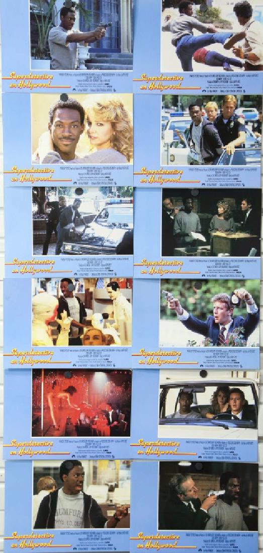 BEVERLY HILLS COP. SET OF 12 LOBBY CARDS: BEVERLY HILLS COP. SET OF 12 LOBBY CARDS Height: 9 in. by Width: 13