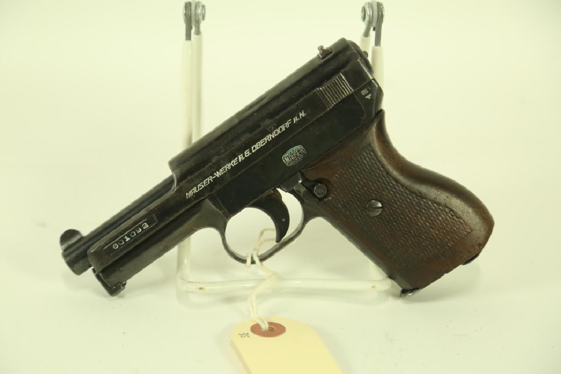MAUSER 1934 .32 CALIBER PISTOL. GERMAN MARKINGS CA: MAUSER 1934 .32 CALIBER PISTOL. GERMAN MARKINGS CALIBER: .32 SERIAL NUMBER: 601092 (L1211)
