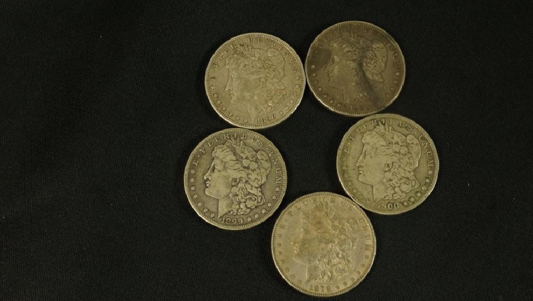 LOT OF FIVE 19TH CENTURY LIBERTY SILVER DOLLARS: LOT OF FIVE 19TH CENTURY LIBERTY SILVER DOLLARS. DATED 1900, 1879, 1880, 1890, 1899. Only guaranteed payment accepted on this item.