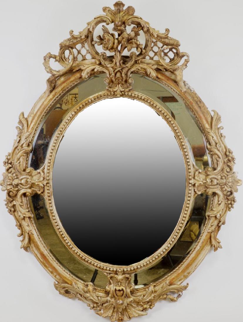 19th CENTURY FRENCH BAROQUE CARVED MIRROR: 19th CENTURY FRENCH BAROQUE CARVED MIRROR. NEEDS MINOR RESTORTION. Height: 54 in. by Width: 42 in. by Depth: 6 in.