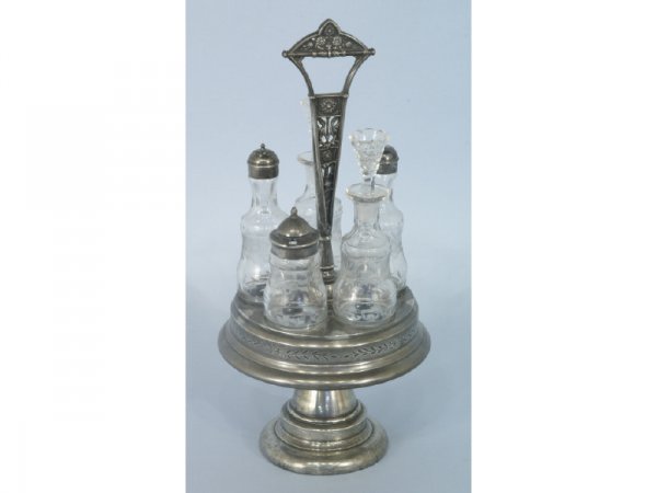 Silver plate over white metal condiment set